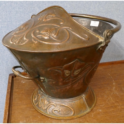 369 - An Art Nouveau copper coal scuttle