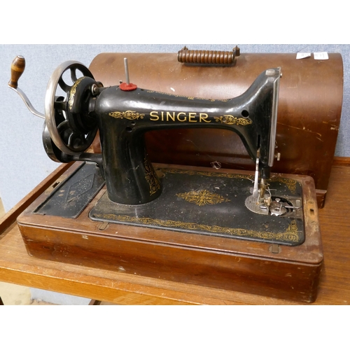 370 - A cased Singer sewing machine