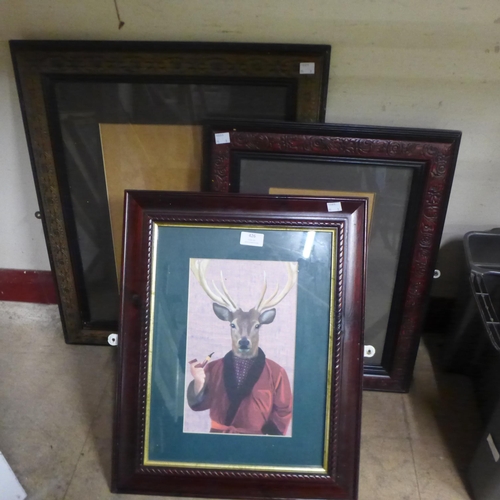 426 - Two oak picture frames and a print