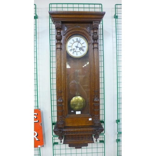 442 - A French carved oak wall clock