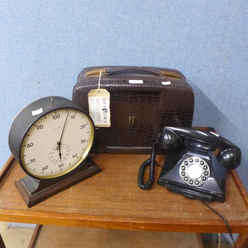 456 - A vintage radio, a mantel clock and a telephone