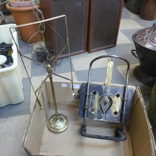 466 - A brass music stand and a Victorian trivet