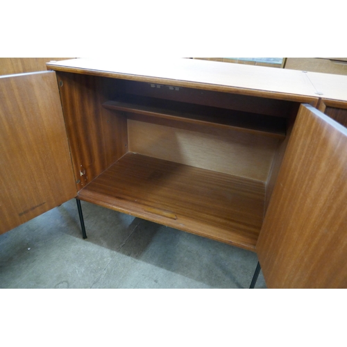 47 - A fitted tola wood sideboard