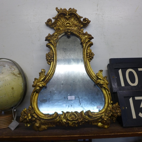 476 - A Rococo style gilt framed mirror