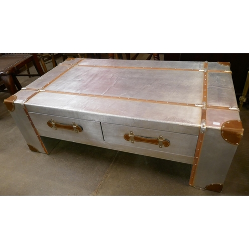 95 - An aviator style riveted aluminium coffee table