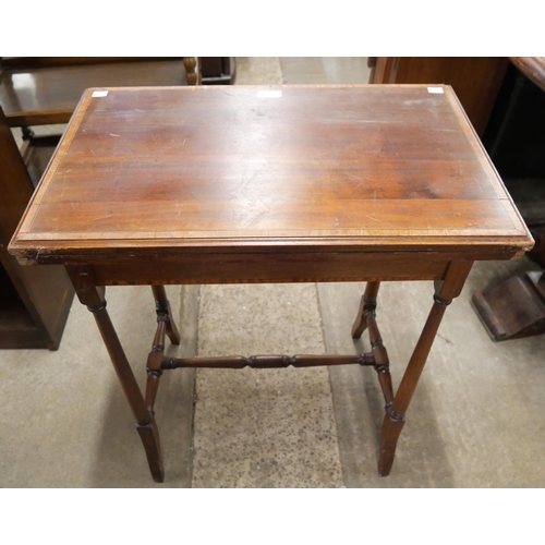 241 - An Edward VII inlaid mahogany fold over card table