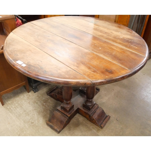 242 - A French hardwood circular centre table