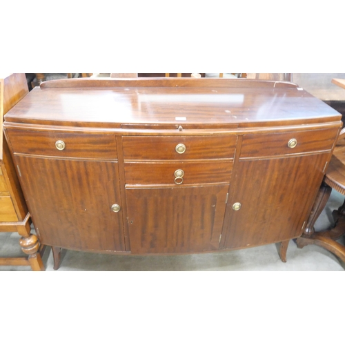 250 - A mahogany bow front sideboard