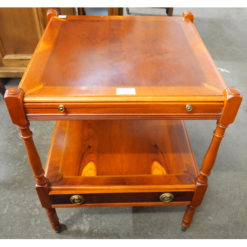 263 - A Regency style yew wood etagere