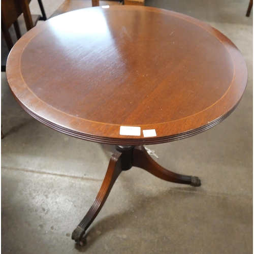 264 - A Regency style inlaid mahogany circular tripod occasional table