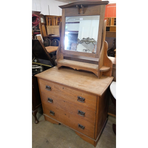 268 - An Arts and Crafts oak dressing chest