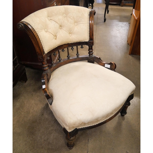 272 - A Victorian carved walnut and fabric upholstered lady's chair