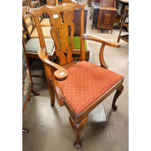 286 - A George III elm elbow chair