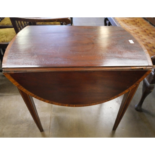 288 - A George III mahogany and satinwood crossbanded Pembroke table