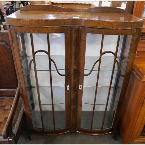 307 - An oak display cabinet