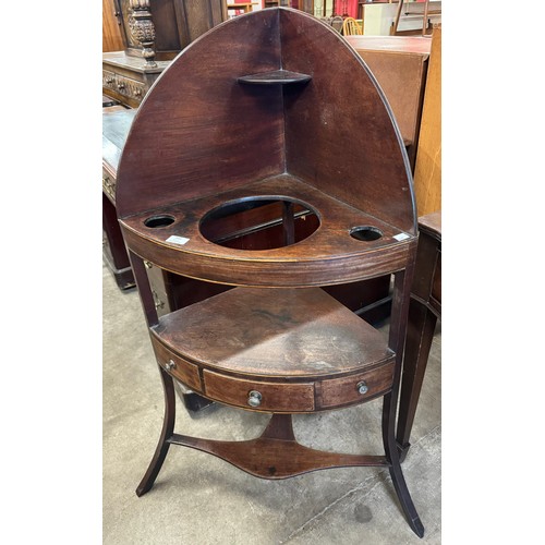 213 - A George III mahogany corner washstand