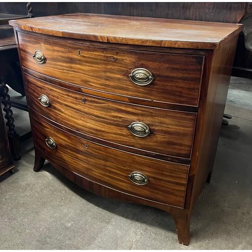 195A - A George III mahogany bow front chest of drawers