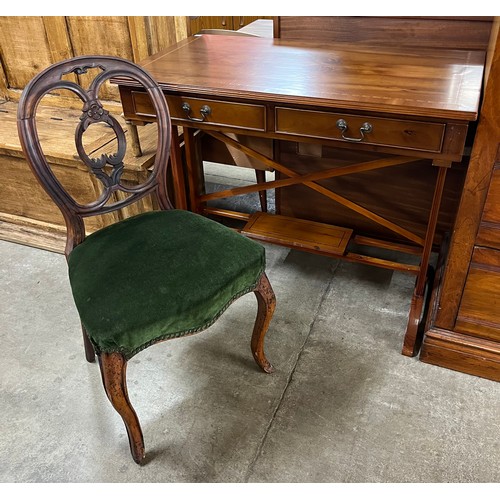 206 - A Regency style inlaid yew wood two drawer writing desk and a Victorian walnut chair