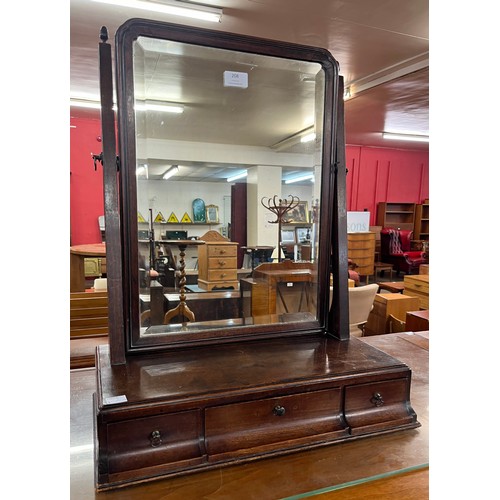 208 - A George III mahogany toilet mirror