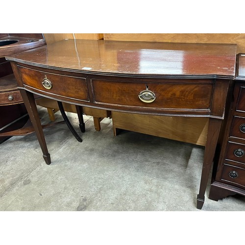 216 - A Regency style mahogany two drawer bow front serving table