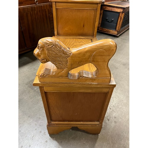 225 - A carved oak telephone seat