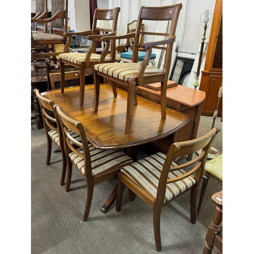 316 - A Regency style mahogany pedestal dining table and six chairs