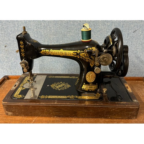 371 - A cased Singer sewing machine