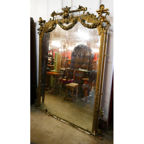 257A - A large Victorian gilt gesso framed mirror