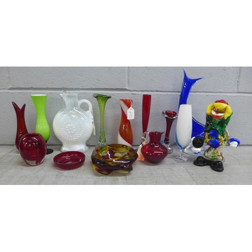 1067 - A box of mixed coloured glass including Murano clown, West German vase, Swedish bud vases **PLEASE N... 