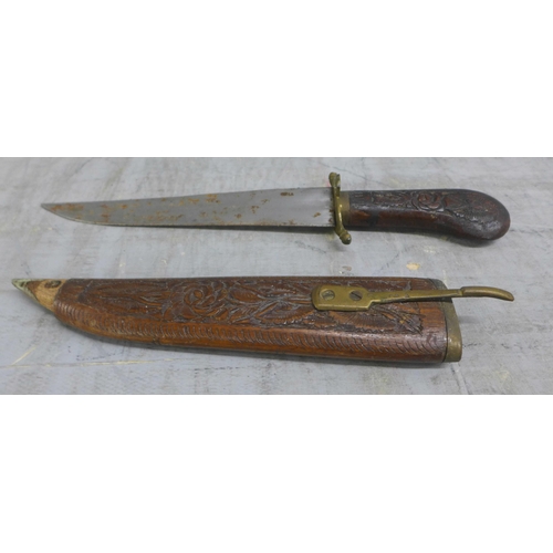 1068 - A brass axe, three carving knives, flail and a plated flask **PLEASE NOTE THIS LOT IS NOT ELIGIBLE F... 