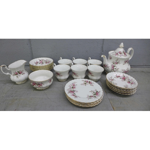 1082 - A Royal Albert Lavender Rose bone china tea service; full set of six, teapot, bread and butter plate... 