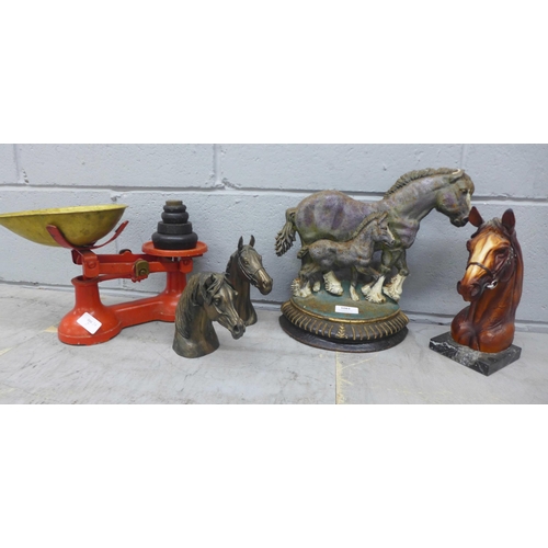 1083 - A horse door stop, two resin horse heads, a resin horse head on marble base and a set of Thornton & ... 