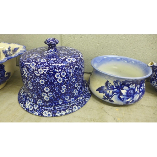 1084 - A Burleigh Calico blue and white rolling pin, a cheese dome and stand, tea pot, wash jug and bowl, e... 