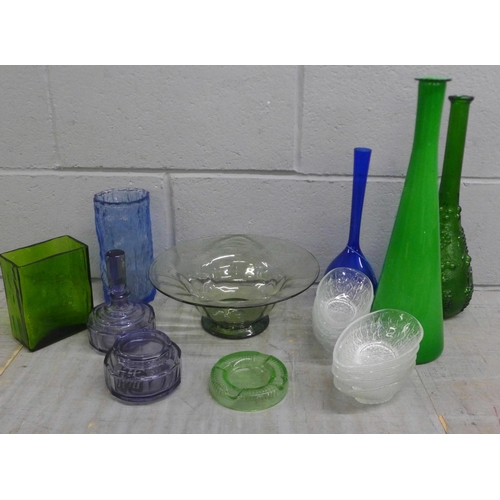 1096 - A collection of coloured glass, lilac two piece glass dressing table set, bark effect blue vase, etc... 