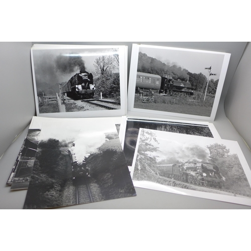 619 - A collection of 58 1960s black and white photographs of steam trains and later locomotives