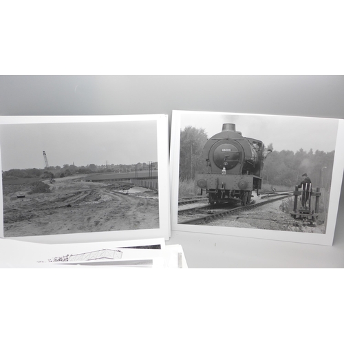 619 - A collection of 58 1960s black and white photographs of steam trains and later locomotives