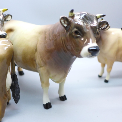 624 - Two Beswick Jersey cow families comprising Ch. Newton Tinkle x3, Ch. Dunsley Coy Boy x2 and two calv... 