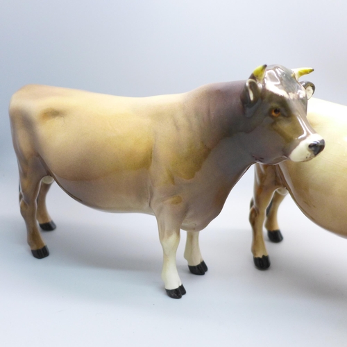 624 - Two Beswick Jersey cow families comprising Ch. Newton Tinkle x3, Ch. Dunsley Coy Boy x2 and two calv... 