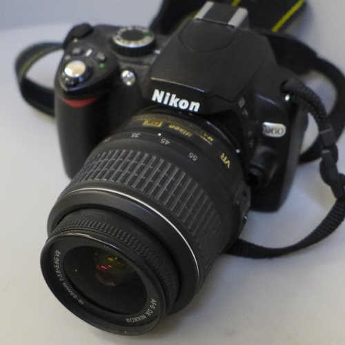 642 - A Nikon D60 digital camera with a Nikon DX 18-55mm lens