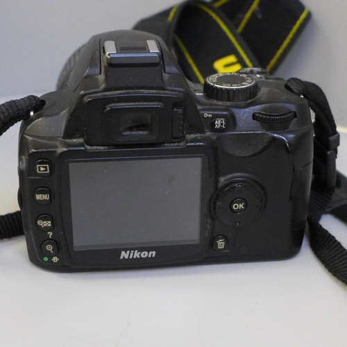 642 - A Nikon D60 digital camera with a Nikon DX 18-55mm lens