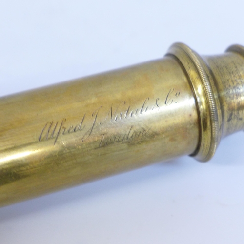 644 - An Alfred J. Natali & Co. mid 19th Century telescope, brass body and leather covered