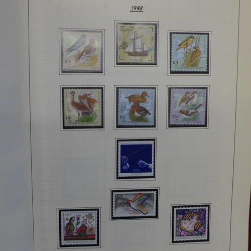 657 - Stamps; an album of mainly unmounted mint German stamps from the period 1990-2003, catalogues at ove... 