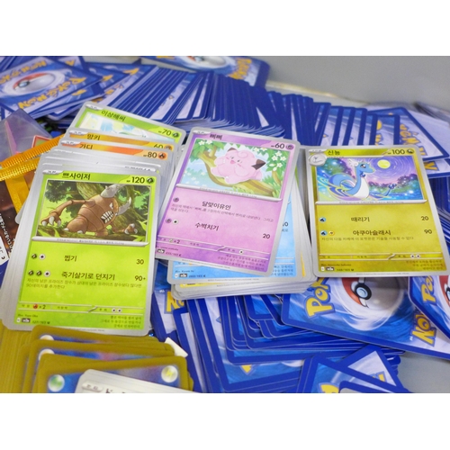 664 - Open packs of Pokemon cards, Japanese and English and Pokemon stickers