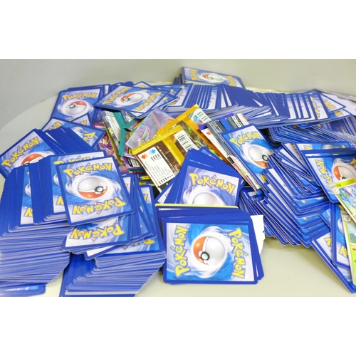 664 - Open packs of Pokemon cards, Japanese and English and Pokemon stickers