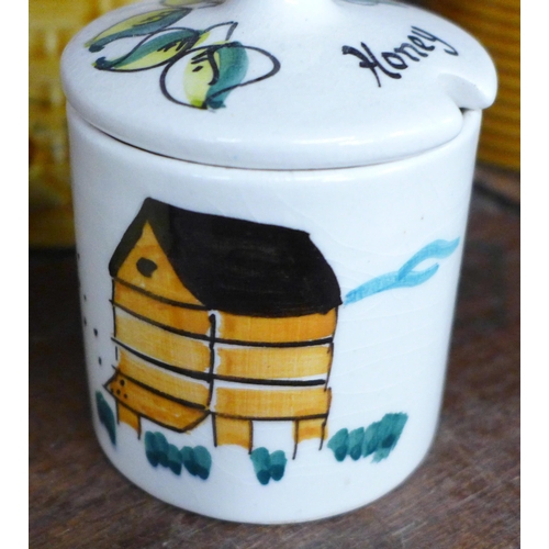 681 - Seven pottery honey pots