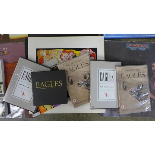 691 - Seven The Eagles LP records including Eagles Greatest Hits Vol 2, book and DVDs and Frankie Goes To ... 