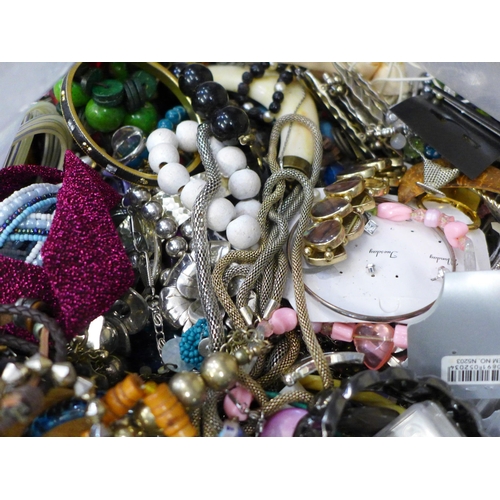 703 - A large bag of mixed costume jewellery, approximately 8kg