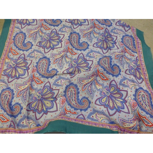 712 - A collection of approximately 20 lady's silk and other scarves