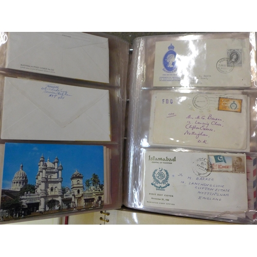 715 - A collection of stamps; British presentation packs, assorted covers, two Stamp of the World album bo... 