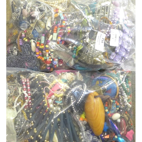 716 - Two bags of costume jewellery